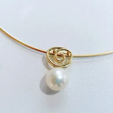 Perle mit Instrumenten Schnecke