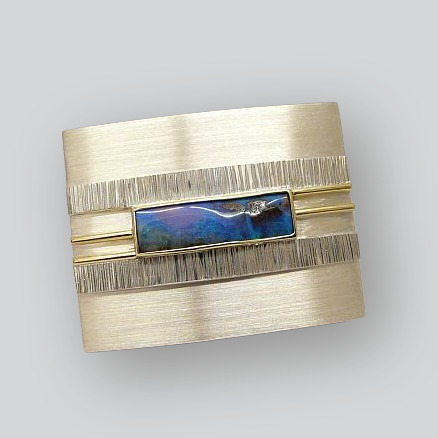 Gürtelschnalle · Silber & Gelbgold mit Boulderopal